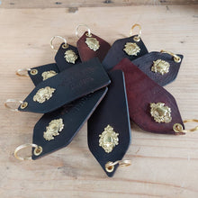 Load image into Gallery viewer, Saddle leather Keyrings with solid brass Crest
